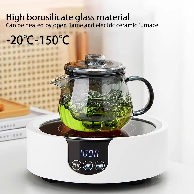 Heat-resistant borosilicate glass teapot on electric ceramic stove, stovetop safe loose leaf tea maker with lid