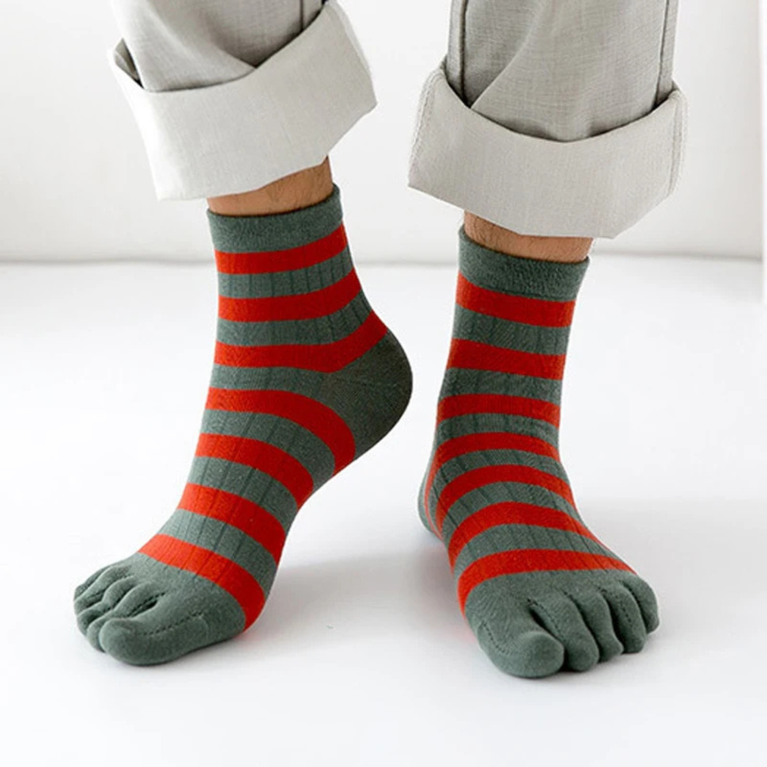 Men wearing green and red striped five finger cotton socks breathable casual toe socks crew length comfortable everyday wear